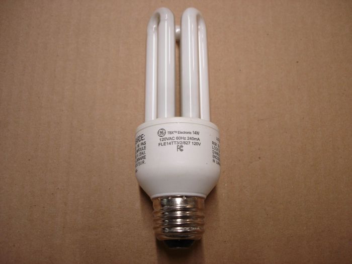 GE 14W CFL
A General Electric 14W triple tube TBX warm white compact fluorescent lamp with electronic programmed start. 

Made in: China

Manufactured: 2009?

Colour temperature: 2700K

Lamp life: 6000 hours

Lamp current: 240 mA

Lumens: 800

Voltage: 120V

Lamp shape: Triple T4 U tube
